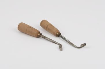 Two curved blade metal opium pipe scrapers