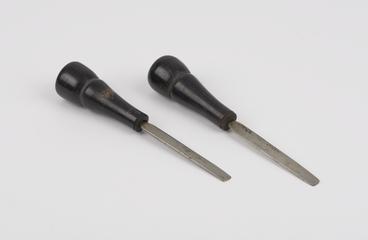 Two straight metal opium pipe scrapers