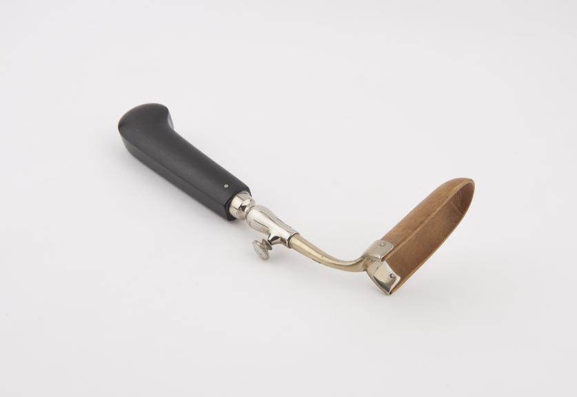 Speculum, vaginal, metal shaft, ebony handle, light wood blade