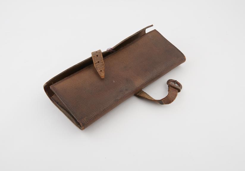 Surgical instrument set in leather wallet