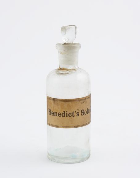 Glass bottle, labeled Benedict's Solution (bottles)