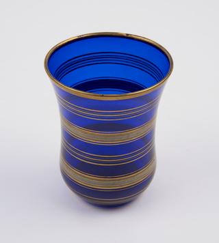 Matching blue glass tumbler from spitoon set