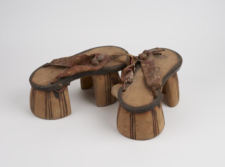 Pair of wooden pattens on large platform heels