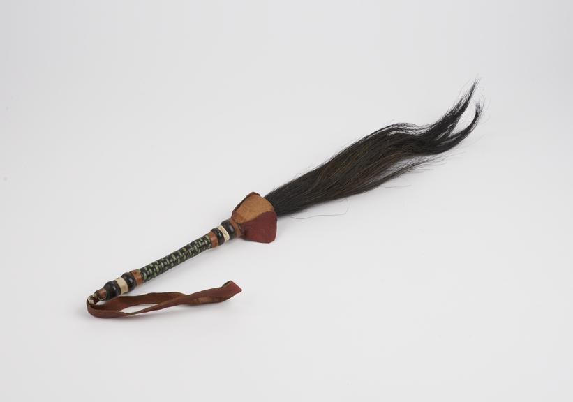 Horse hair fly whisk with leather handle and strap