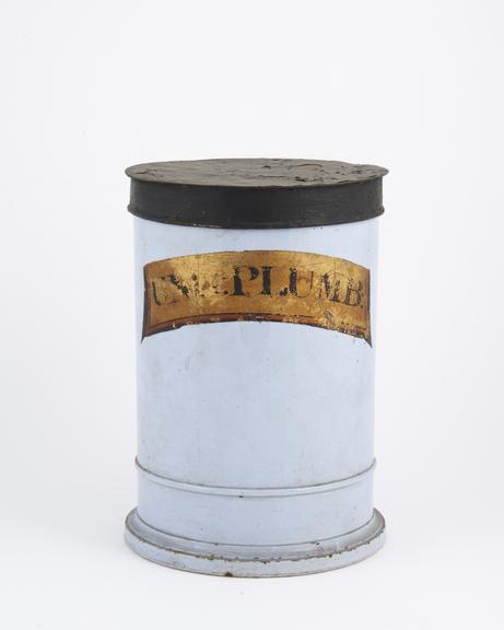 Pale blue drug jar with gold label, for UNG