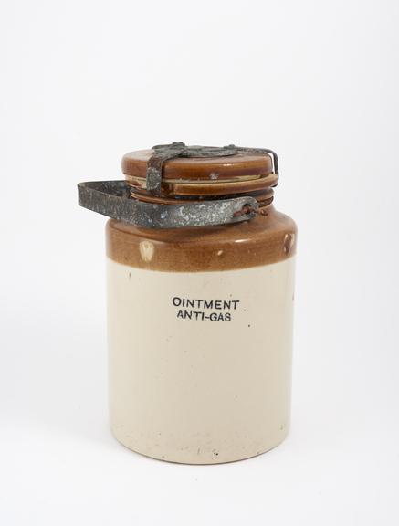 Empty anti-gas ointment jar, with lid