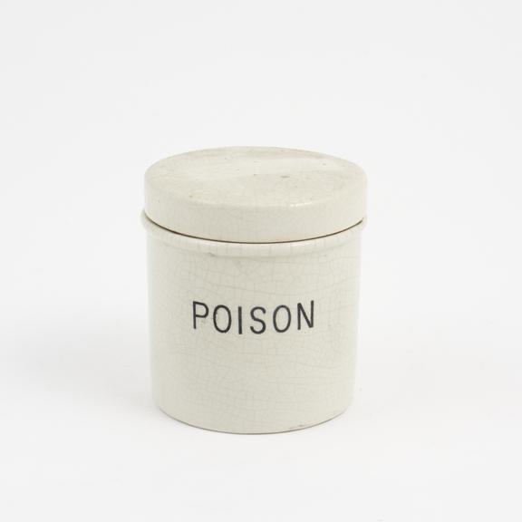 Earthenware drug jar with lid, marked POISON'