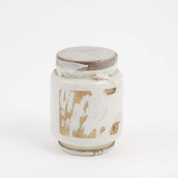 Earthenware drug jar with lid