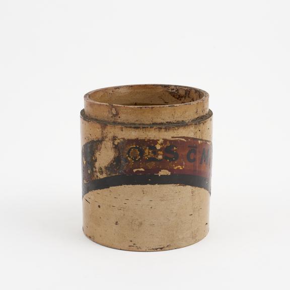 Small salt glazed stoneware dispensing pot containing extract
