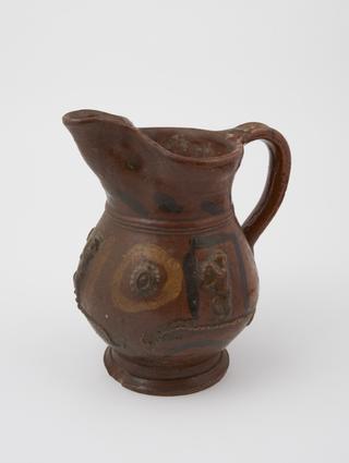 Jug, terracotta, with religious decoration