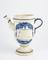 Syrup jug, Italian, late C18 blue and white maiolica with coat