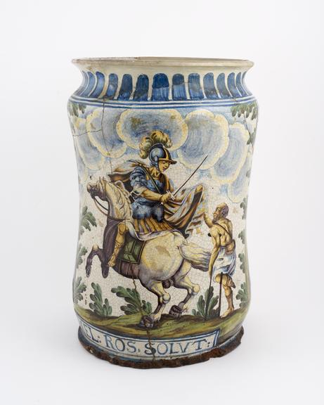 Earthenware, tin-glazed albarello, with painted scene of St