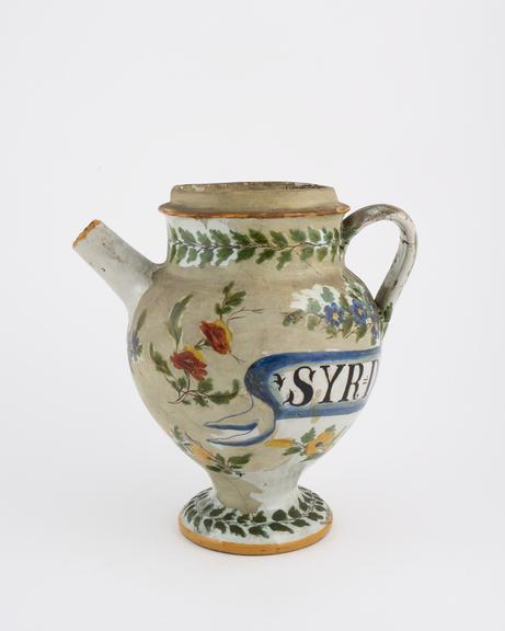 Italian syrup jug, 18th century polychrome maiolica with floral