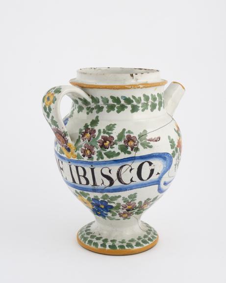 Italian syrup jug, C18 polychrome maiolica with floral