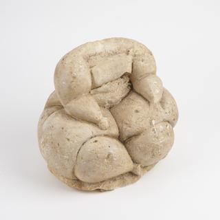 Plaster cast figure with broken stomach