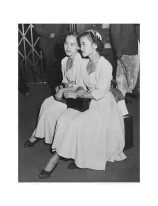 Photograph of immigrant sisters from Jamaica at Waterloo Station