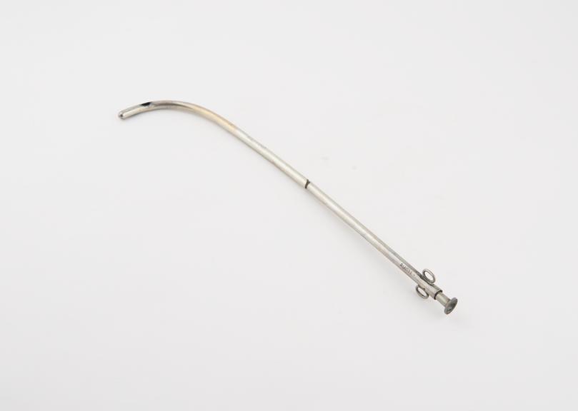 Silver catheter with proximal curve and removable distal sleeve (catheters)