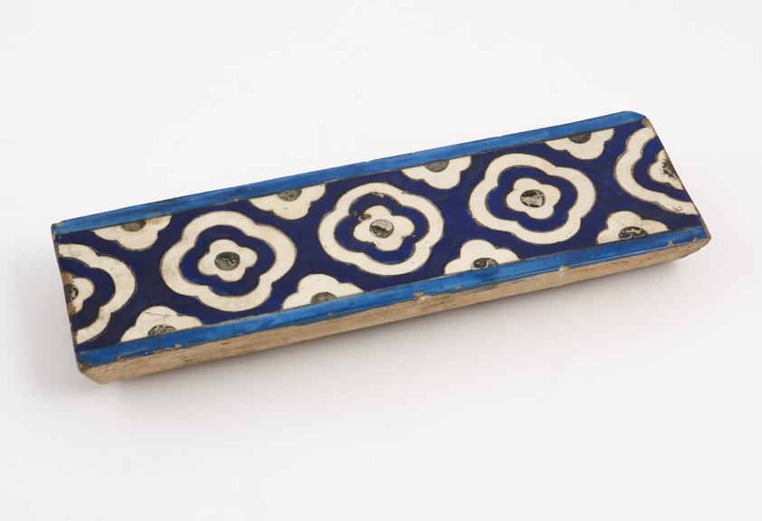 Tin glazed earthenware tile with polychrome decoration