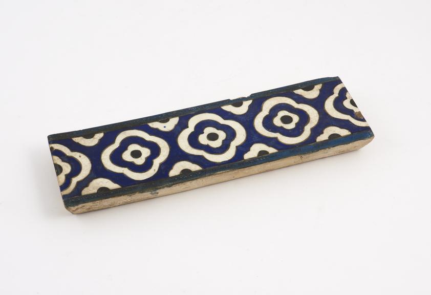 Tin glazed earthenware tile with polychrome decoration of