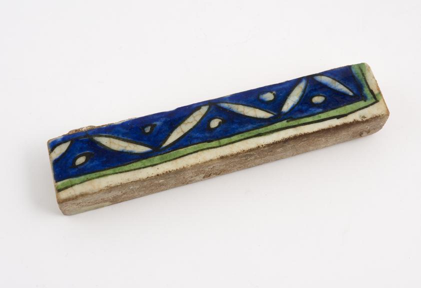 Tin glazed earthenware tile with polychrome decoration