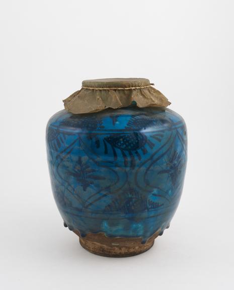 Earthenware drug jar, with parchment lid