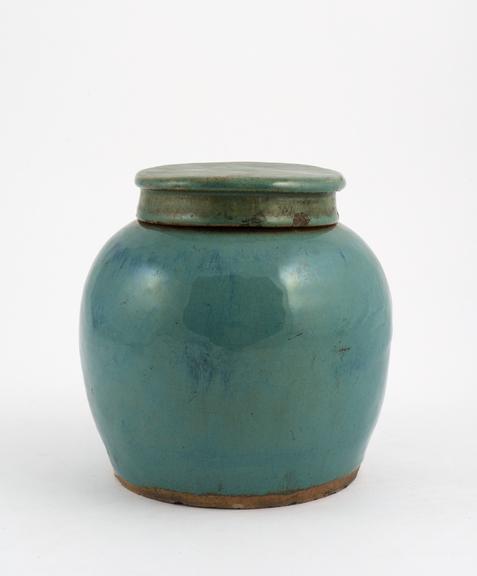 Earthenware drug jar, green glaze, Islamic