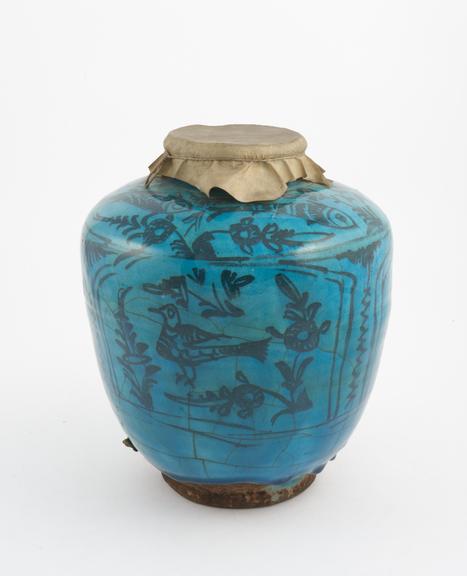 Pottery drug jar, greenish blue, ovoid, with parchment cover