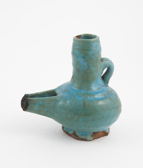 Earthenware vessel, possibly a lamp, turquoise glaze, Islamic