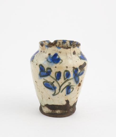 Earthenware drug jar, with blue decoration, probably Persian