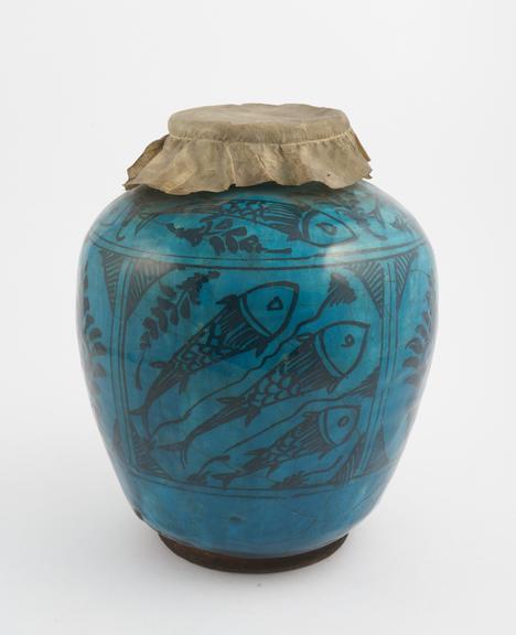 Pottery drug jar, bluish green, ovoid, with parchment cover