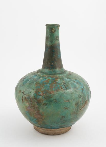 Earthenware flask, turquoise blue glaze, moulded body