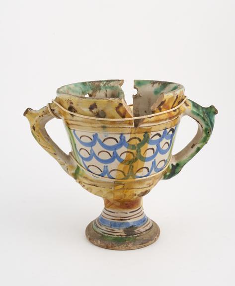 Puzzle cup, polychrome tin glazed earthenware, probably Italian