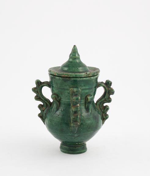 Earthenware drug jar, green glaze, with four handles, Moorish