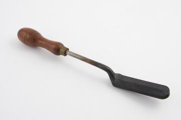 Plaster iron with wooden handle