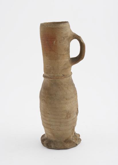 Pottery jug, with 1 handle and 1 thumb imprinted base ring