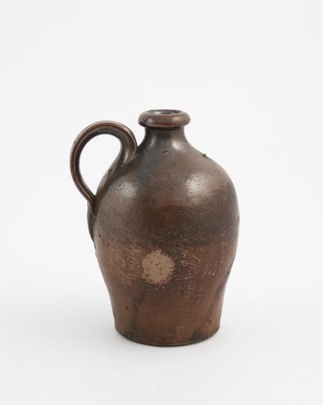 Stoneware jug, ovoid body, vertical strap handle