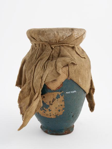 Blue earthenware jar, roughly glazed