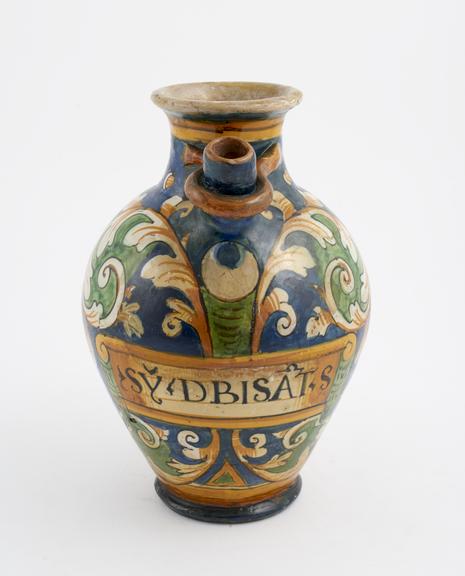 Tin glazed earthenware syrup jar, polychrome decoration