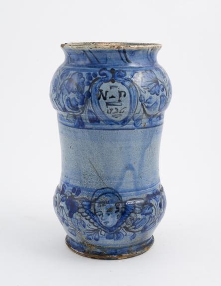 Lead-glazed earthenware albarello, monochrome decoration