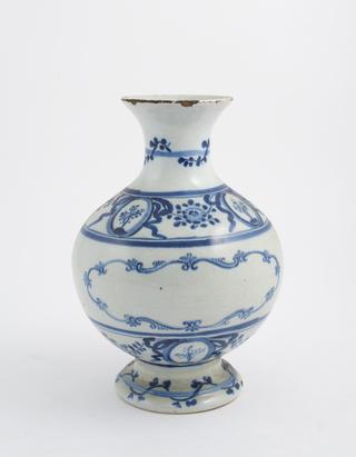 Blue and white pharmacy jar