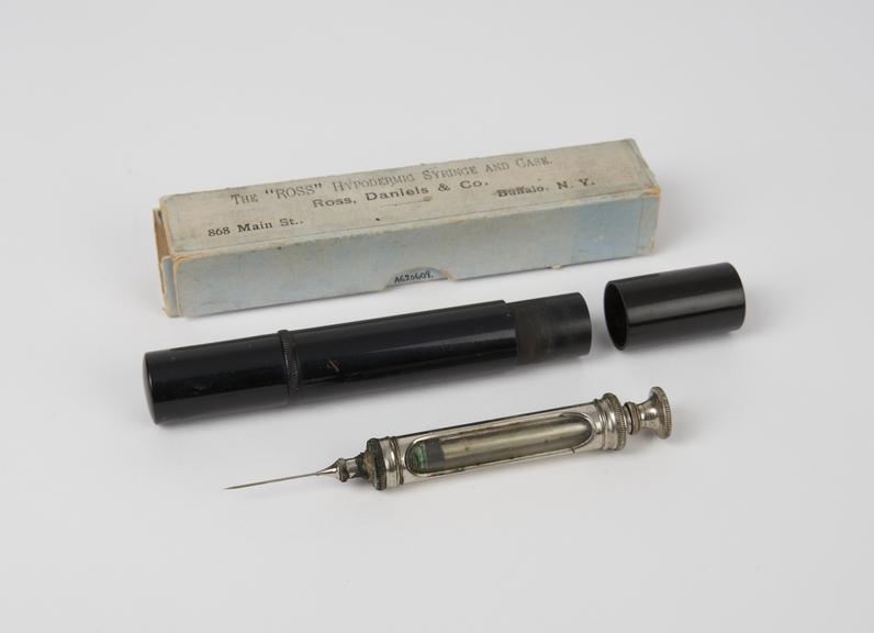 Hypodermic syringe, glass and nickel-plated brass in vulcanite