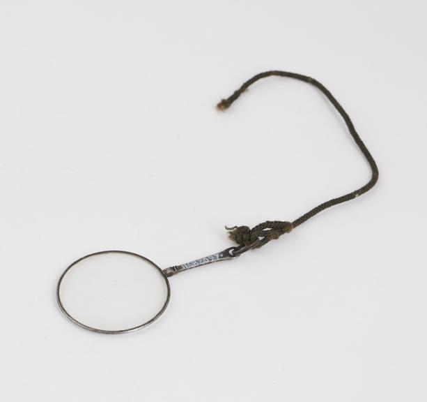 Quizzer spectacles, single lens, handle, steel, cord loop