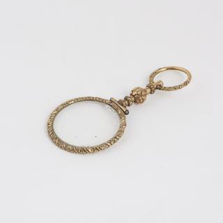 Spectacles, hand, ornate gilt metal quizzer