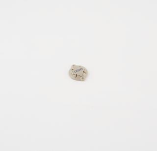 Cap and retaining clip, part of Suretek burr hole cover kit