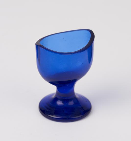 Glass eye bath, blue, with stem, blown, European