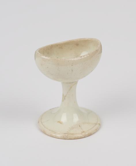 Earthenware eye bath with stem, by Wedgewood, England