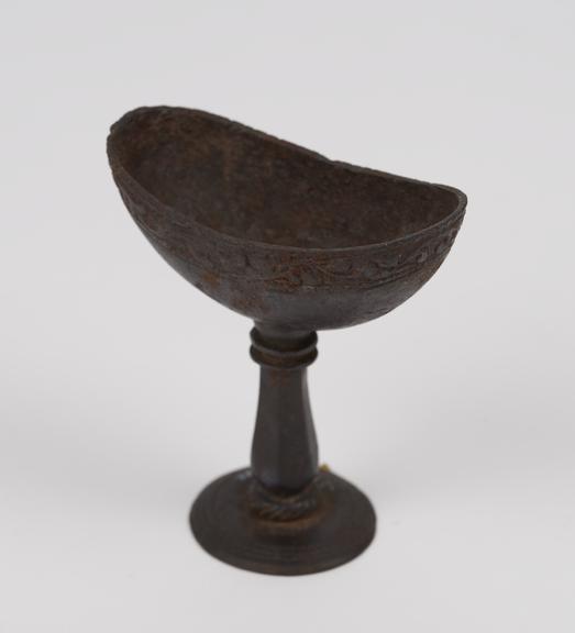 Iron eye bath, with large bowl and stem, possibly 16th century