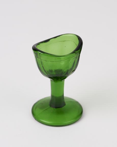 Glass eye bath, green, with stem, moulded, European