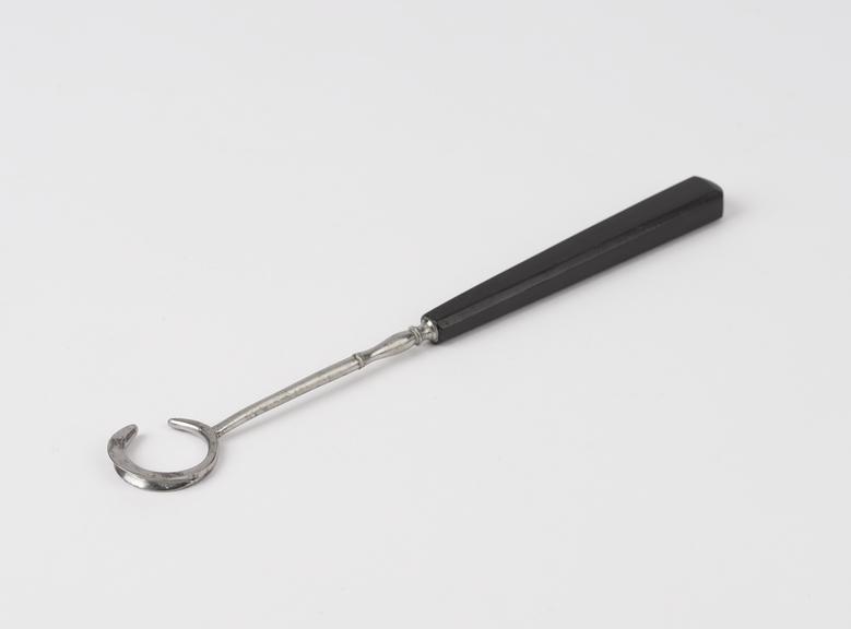 Eyelid retractor, steel and ebonite, possibly French