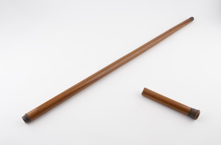 Physician's cane with copper knob handle